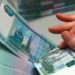 Кыргызстанские банки ужесточают правила денежных переводов в Россию
